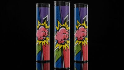 Branded child resistant pre roll tubes in multiple sizes displayed upright with pre-rolls beside them